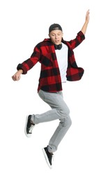 Photo of Handsome young skater jumping on white background