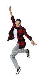 Photo of Handsome young skater jumping on white background