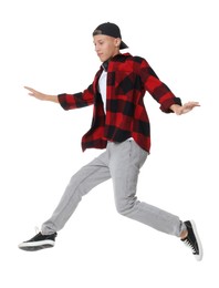 Photo of Handsome young skater jumping on white background