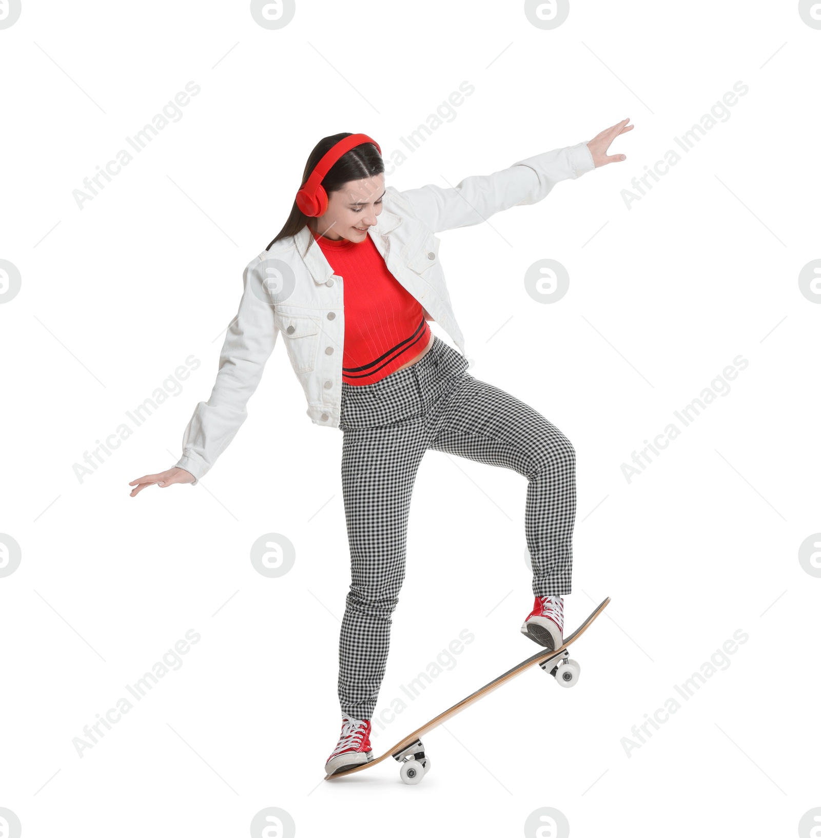 Photo of Smiling woman with skateboard on white background