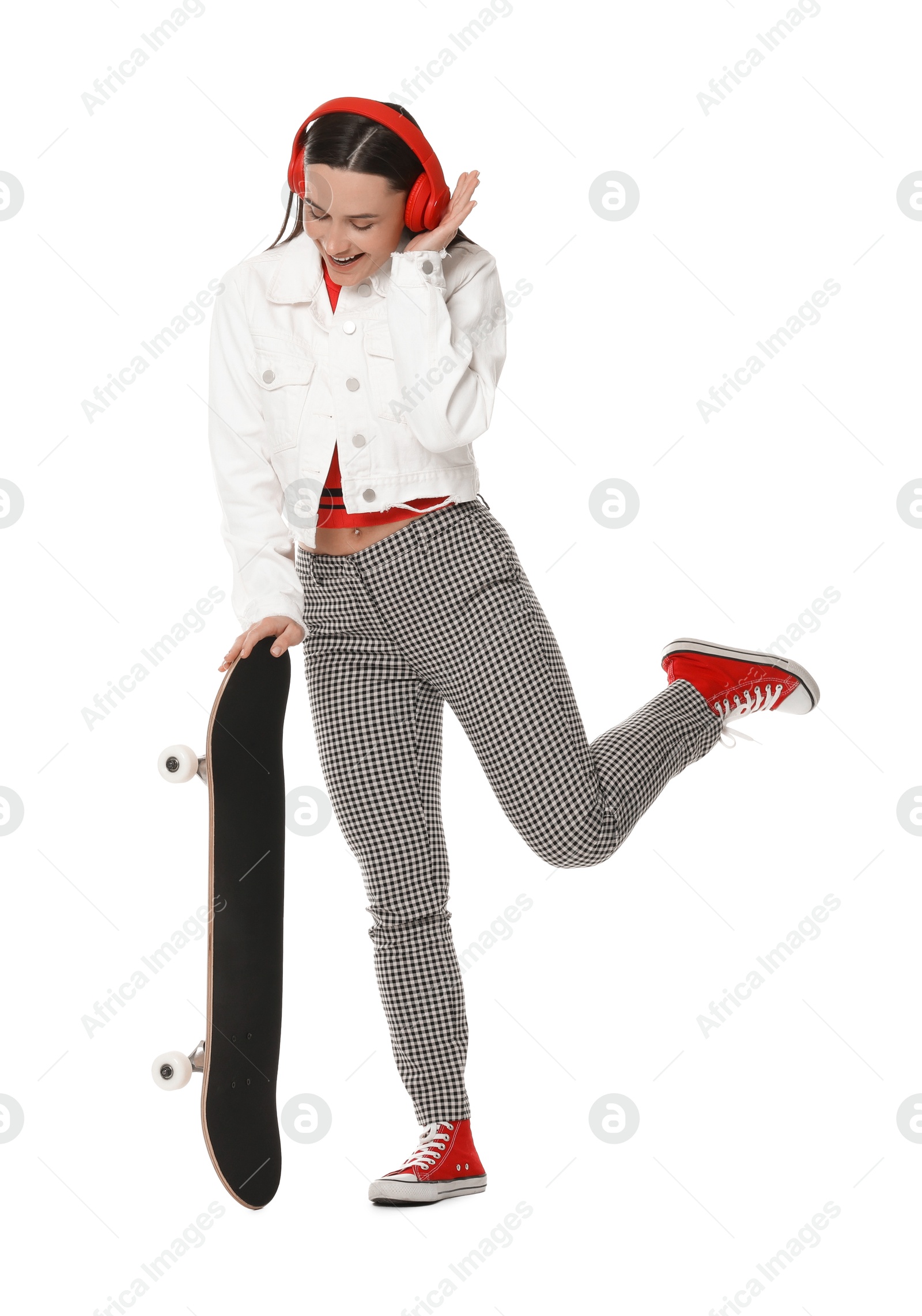 Photo of Smiling woman with skateboard on white background