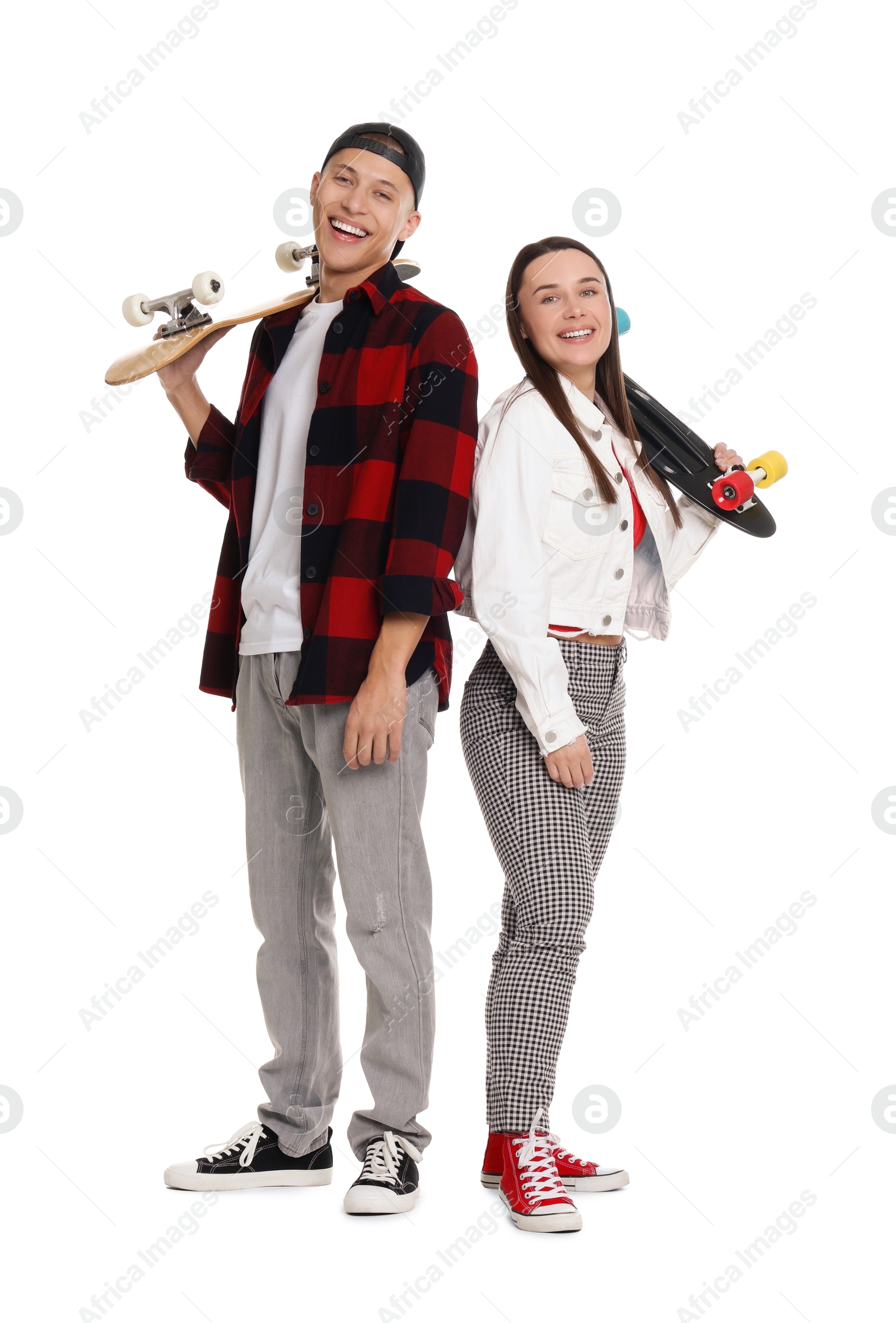 Photo of Happy friends with skateboards on white background