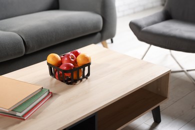 Coffee table, sofa and armchair in living room. Interior design