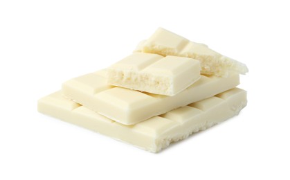 Photo of Pieces of delicious white chocolate isolated on white