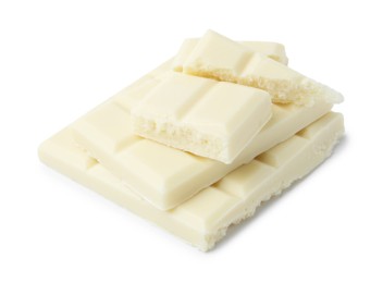 Photo of Pieces of delicious white chocolate isolated on white