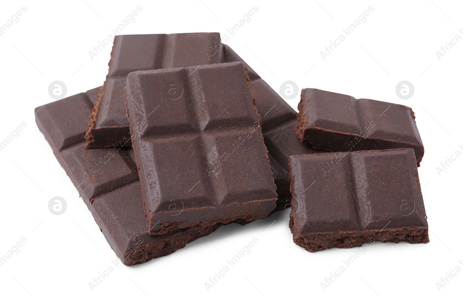 Photo of Pieces of delicious dark chocolate isolated on white