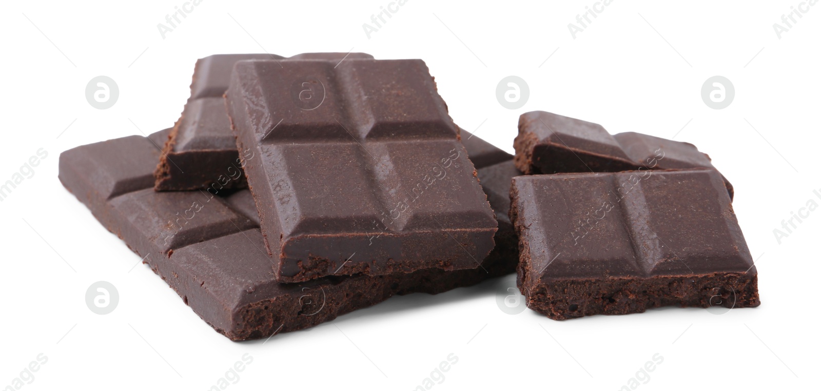 Photo of Pieces of delicious dark chocolate isolated on white