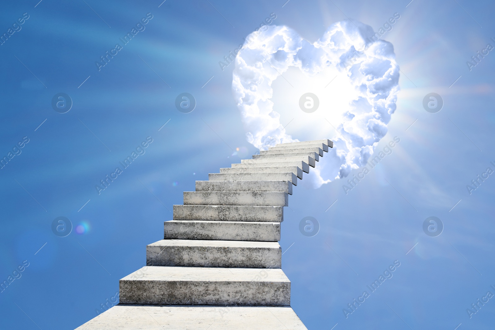 Image of Stairs leading to light in sky through heart made of clouds. Love of God, concept