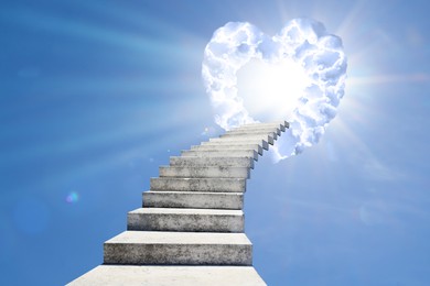 Image of Stairs leading to light in sky through heart made of clouds. Love of God, concept