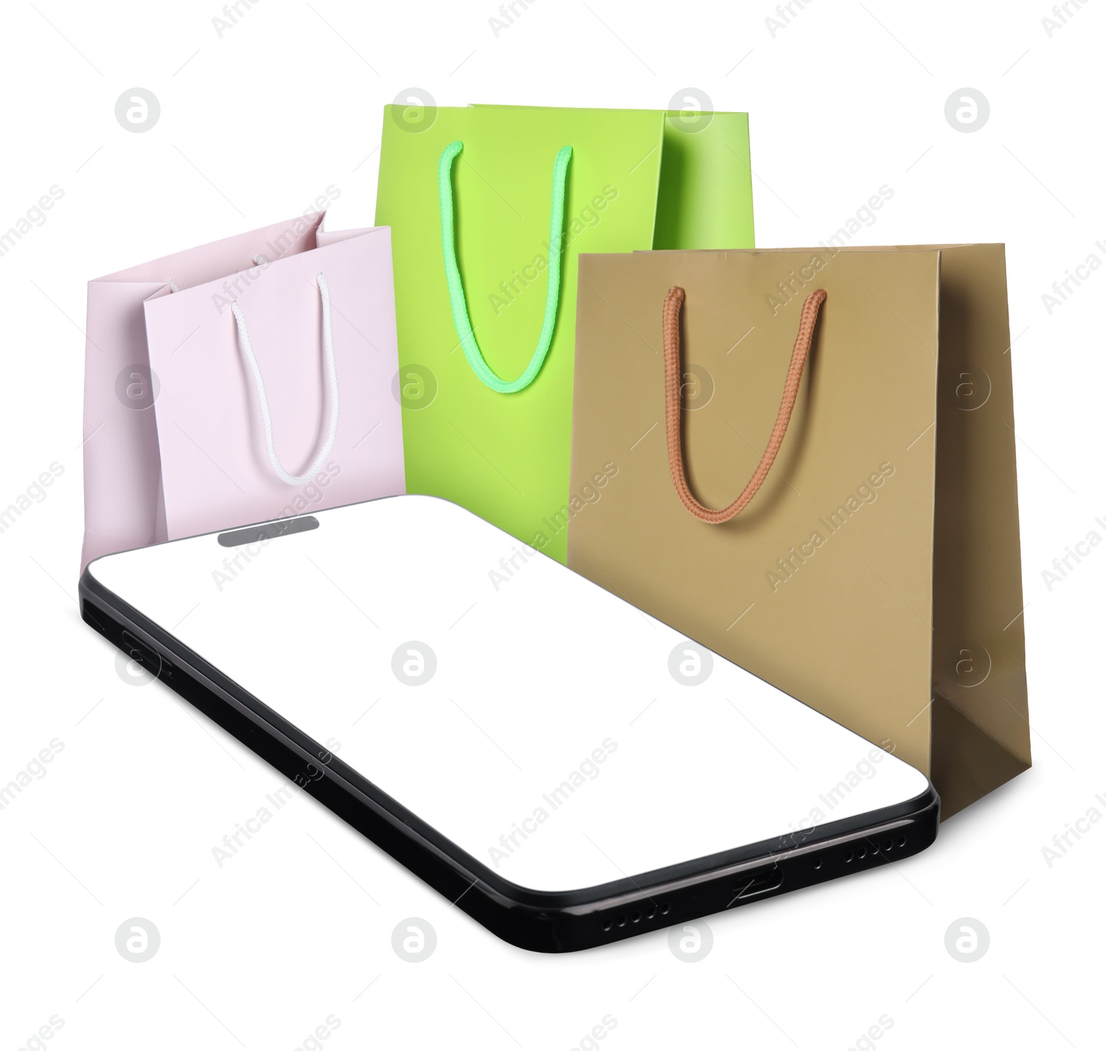 Image of Mobile phone and shopping bags isolated on white. Concept of online shopping, purchase via internet