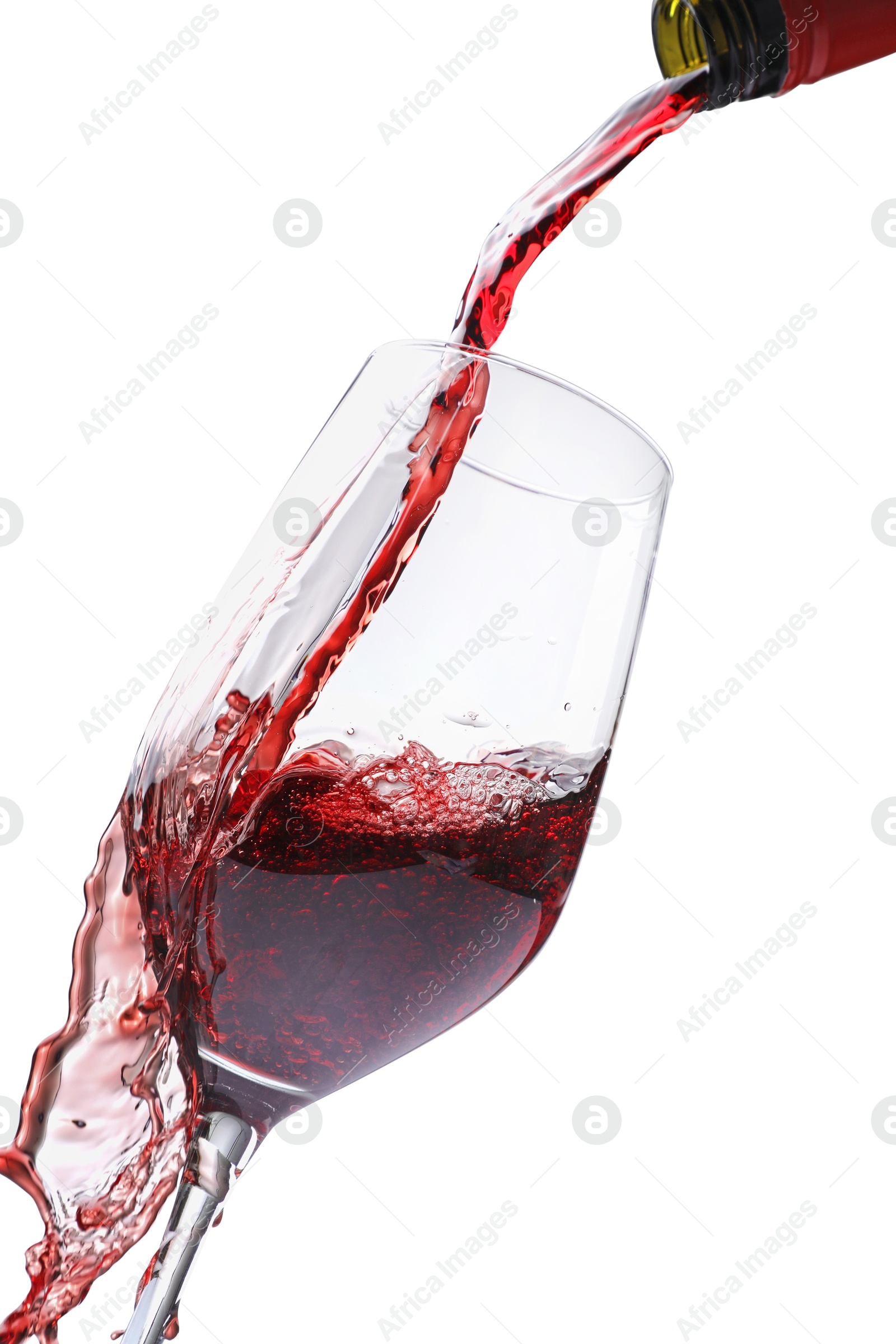 Photo of Pouring red wine into glass isolated on white