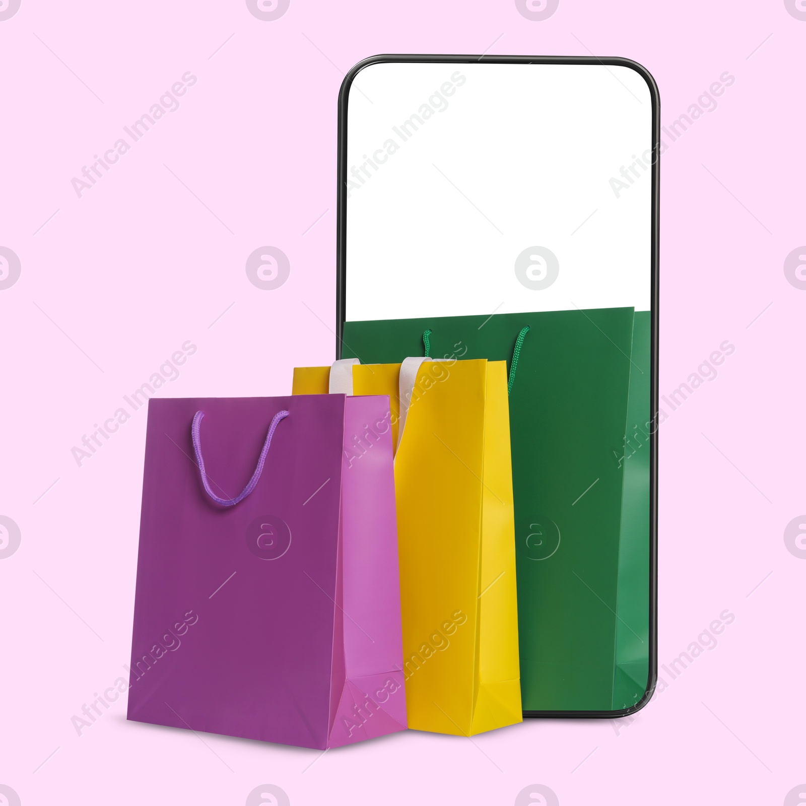 Image of Mobile phone with shopping bags on pink background. Concept of online shopping, purchase via internet