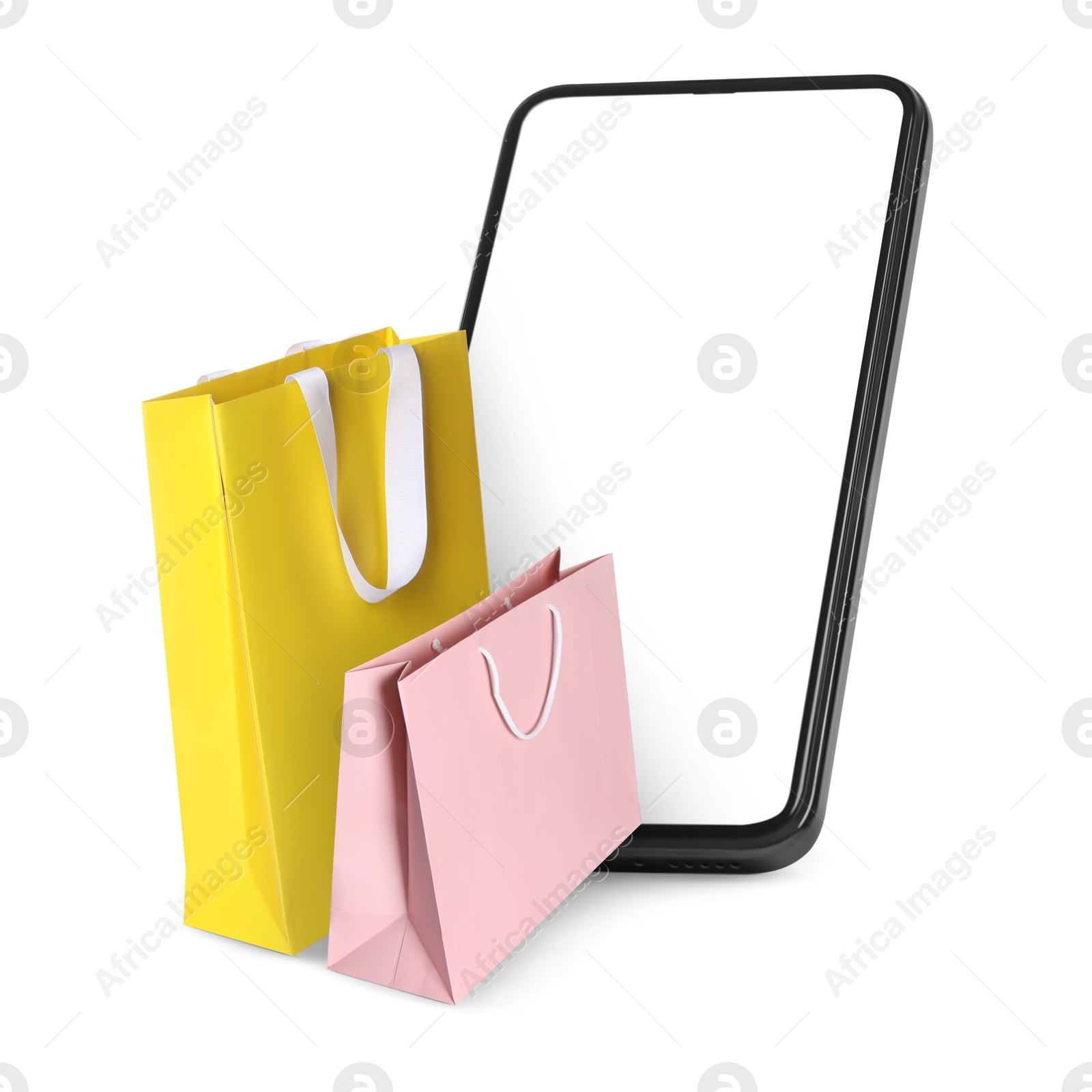 Image of Mobile phone with shopping bags isolated on white. Concept of online shopping, purchase via internet