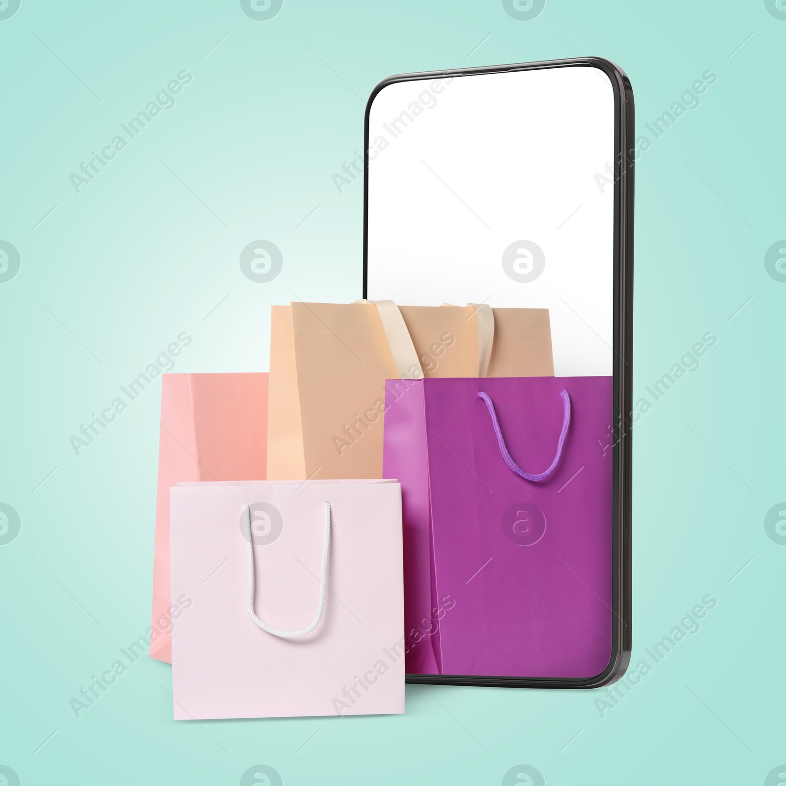 Image of Mobile phone with shopping bags on turquoise background. Concept of online shopping, purchase via internet