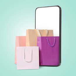 Image of Mobile phone with shopping bags on turquoise background. Concept of online shopping, purchase via internet