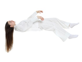 Image of Somnambulist in pajamas on white background. Sleepwalking