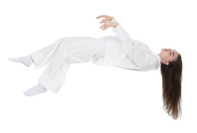 Image of Somnambulist in pajamas on white background. Sleepwalking