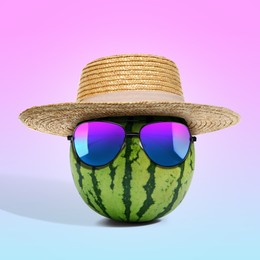 Image of Watermelon with straw hat and sunglasses on color gradient background