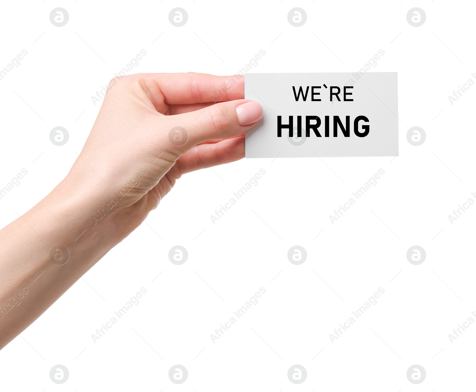 Image of Woman holding card with text We're Hiring on white background, closeup. Human resource