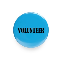 Image of Button badge with word Volunteer isolated on white