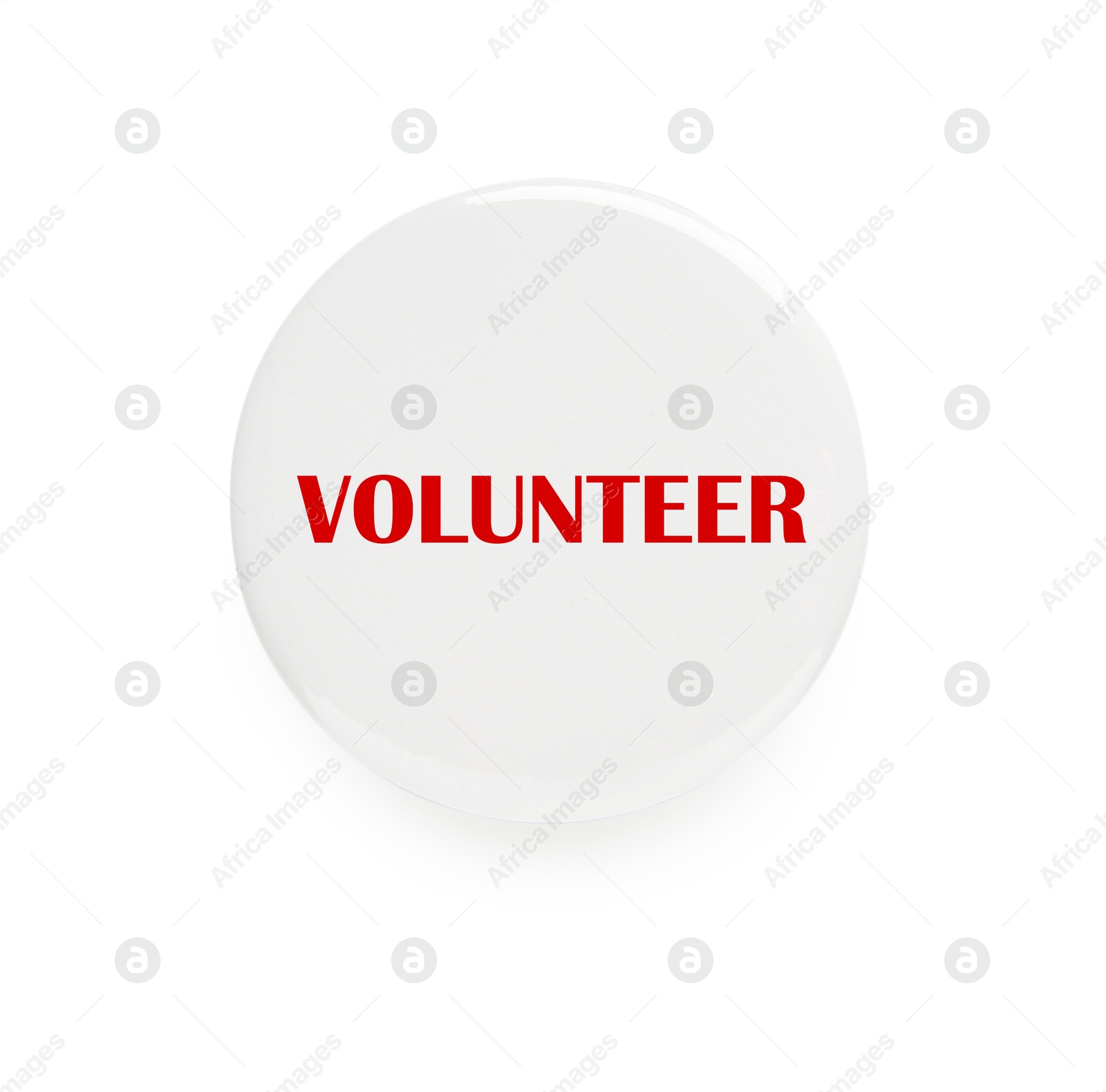 Image of Button badge with word Volunteer isolated on white