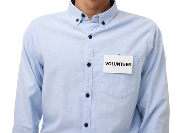 Image of Volunteer with badge on white background, closeup