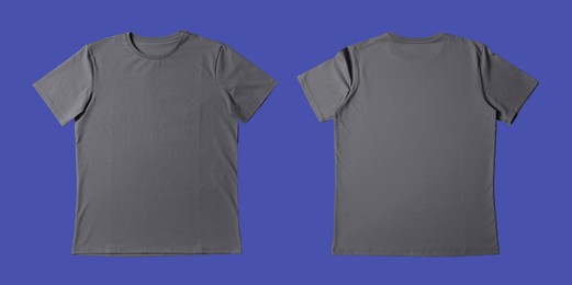 Image of Blank grey t-shirt on blue background, back and front. Mockup for design