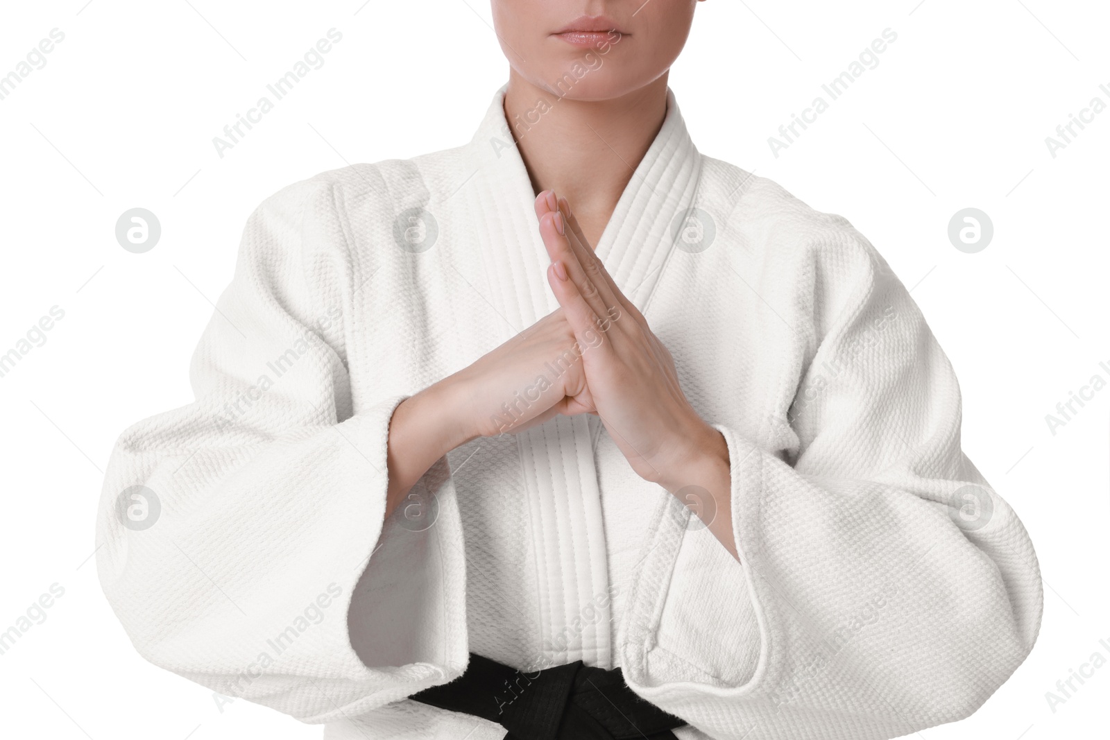 Photo of Karate fighter in kimono isolated on white, closeup