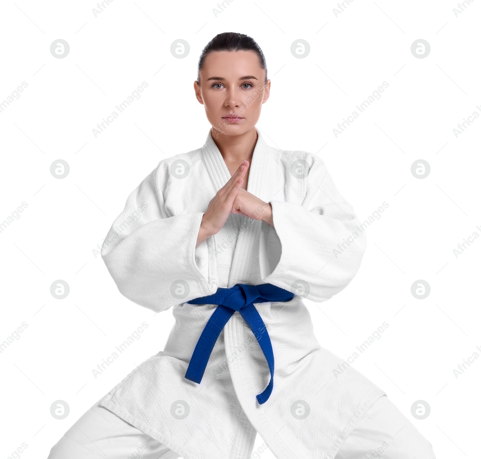 Photo of Karate fighter in kimono isolated on white