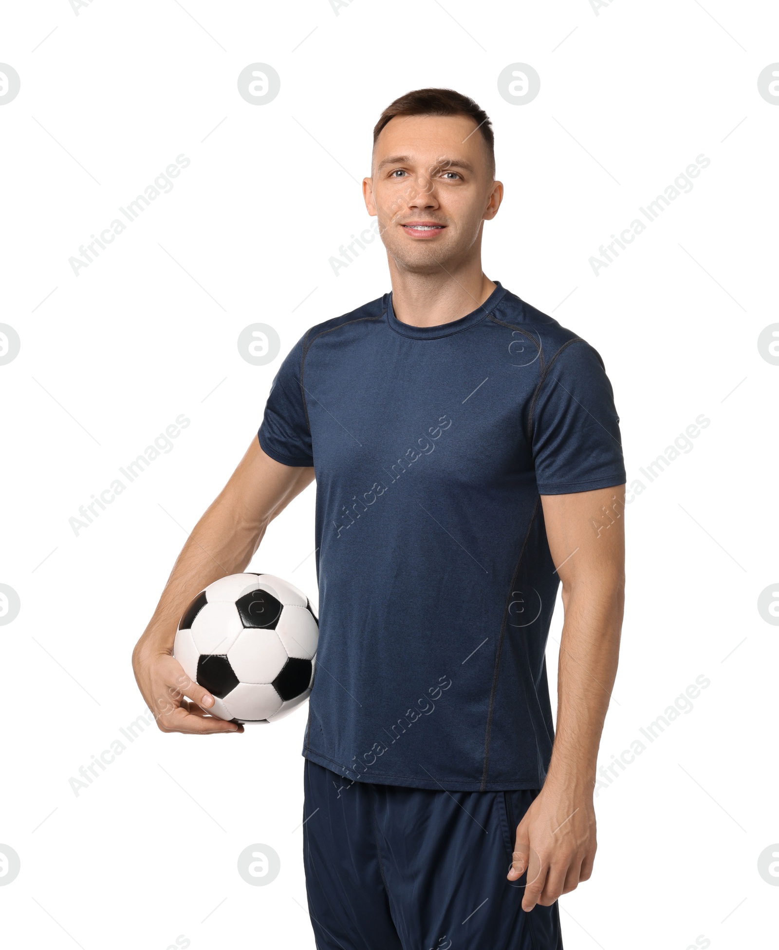 Photo of Smiling football player with soccer ball on white background