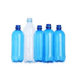 Photo of Many empty plastic bottles isolated on white