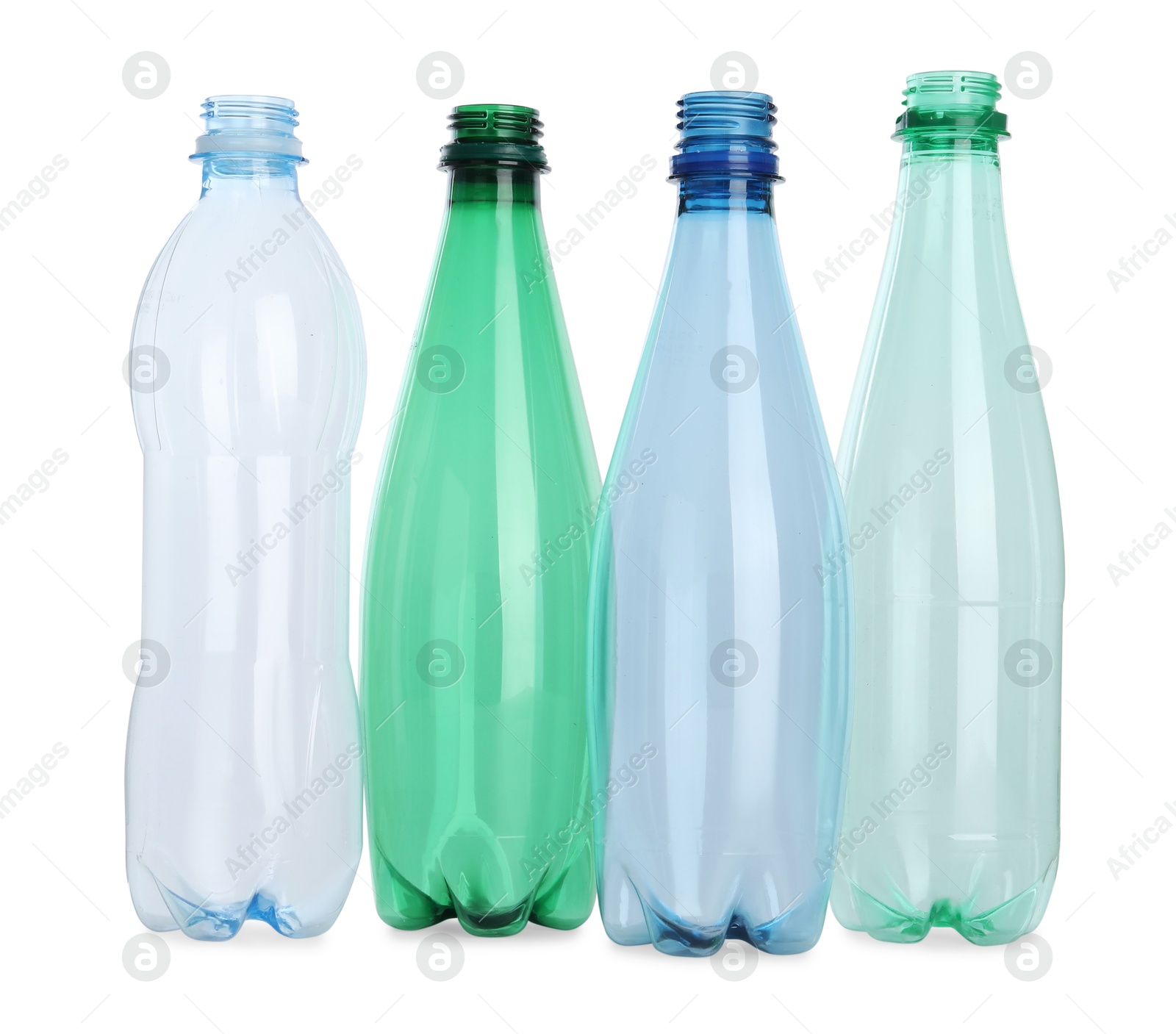 Photo of Many empty plastic bottles isolated on white