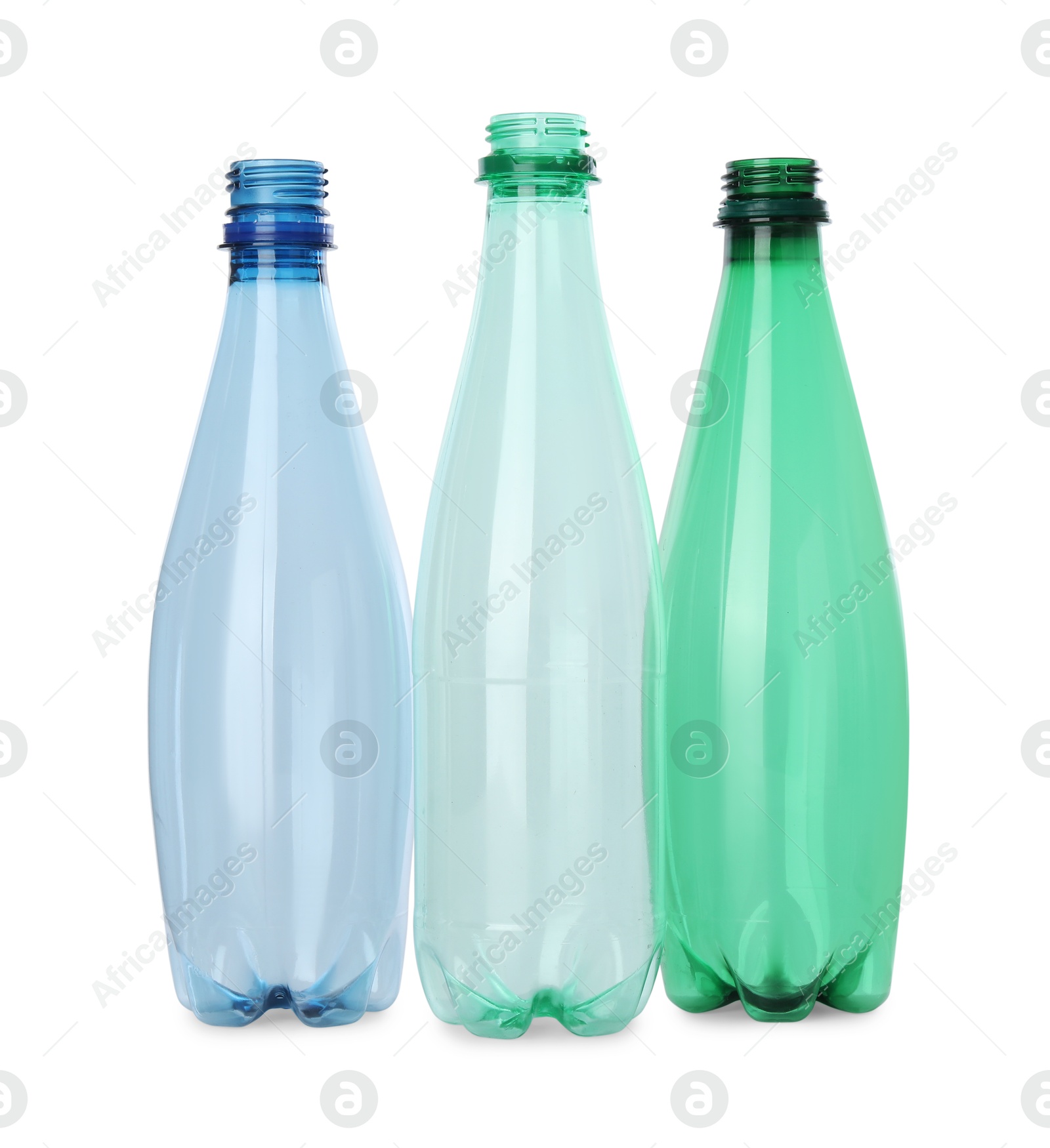 Photo of Many empty plastic bottles isolated on white