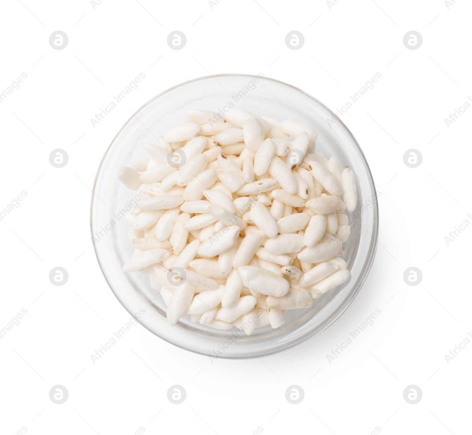 Photo of Puffed rice in bowl isolated on white, top view