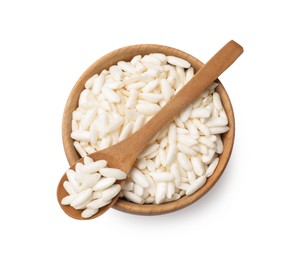 Photo of Puffed rice in bowl and spoon isolated on white, top view