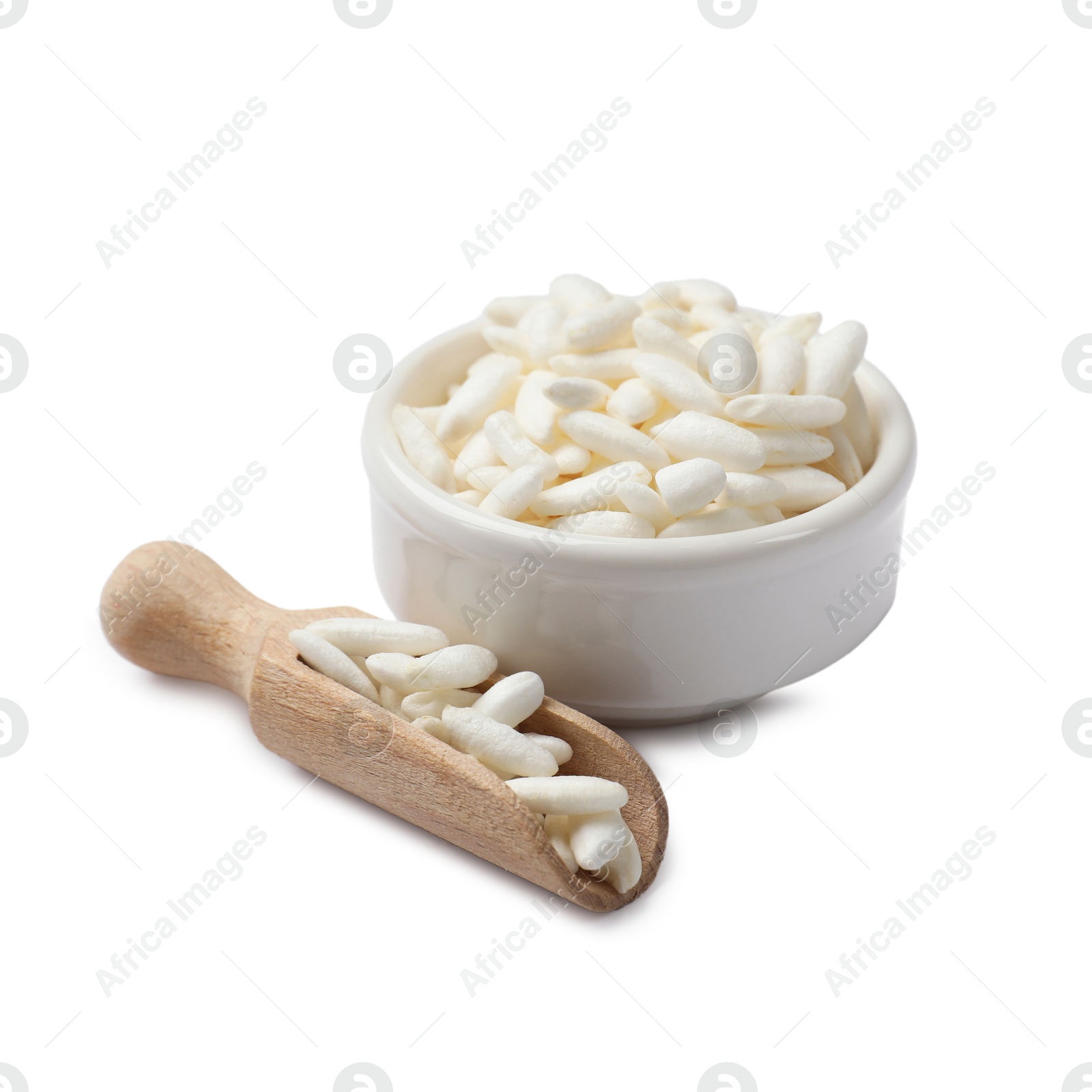 Photo of Puffed rice in bowl and scoop isolated on white