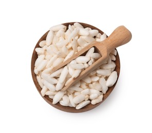 Photo of Puffed rice in bowl and scoop isolated on white, top view