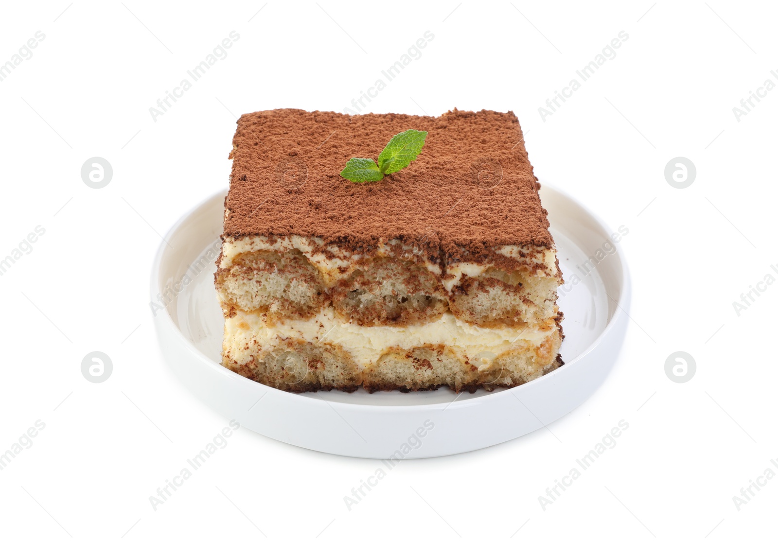 Photo of Delicious tiramisu with mint isolated on white