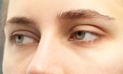 Photo of Macro view of young woman with beautiful eyes