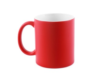 Photo of One blank red ceramic mug isolated on white. Mockup for design