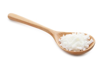 Photo of Soy wax in wooden spoon isolated on white