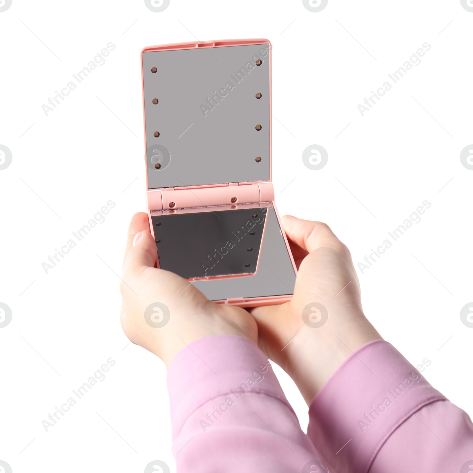 Photo of Woman holding pocket mirror on white background, closeup