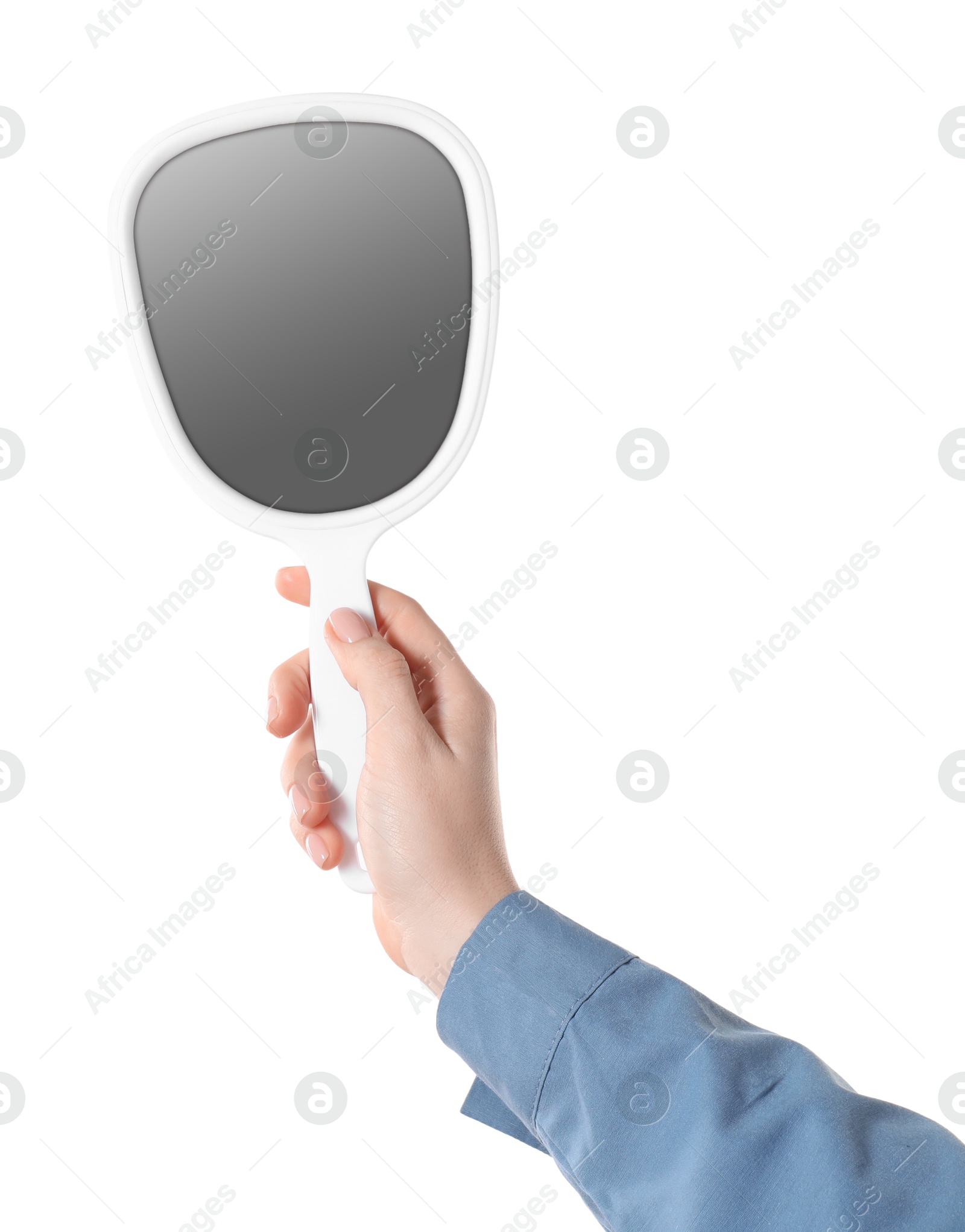 Photo of Woman holding small mirror on white background, closeup