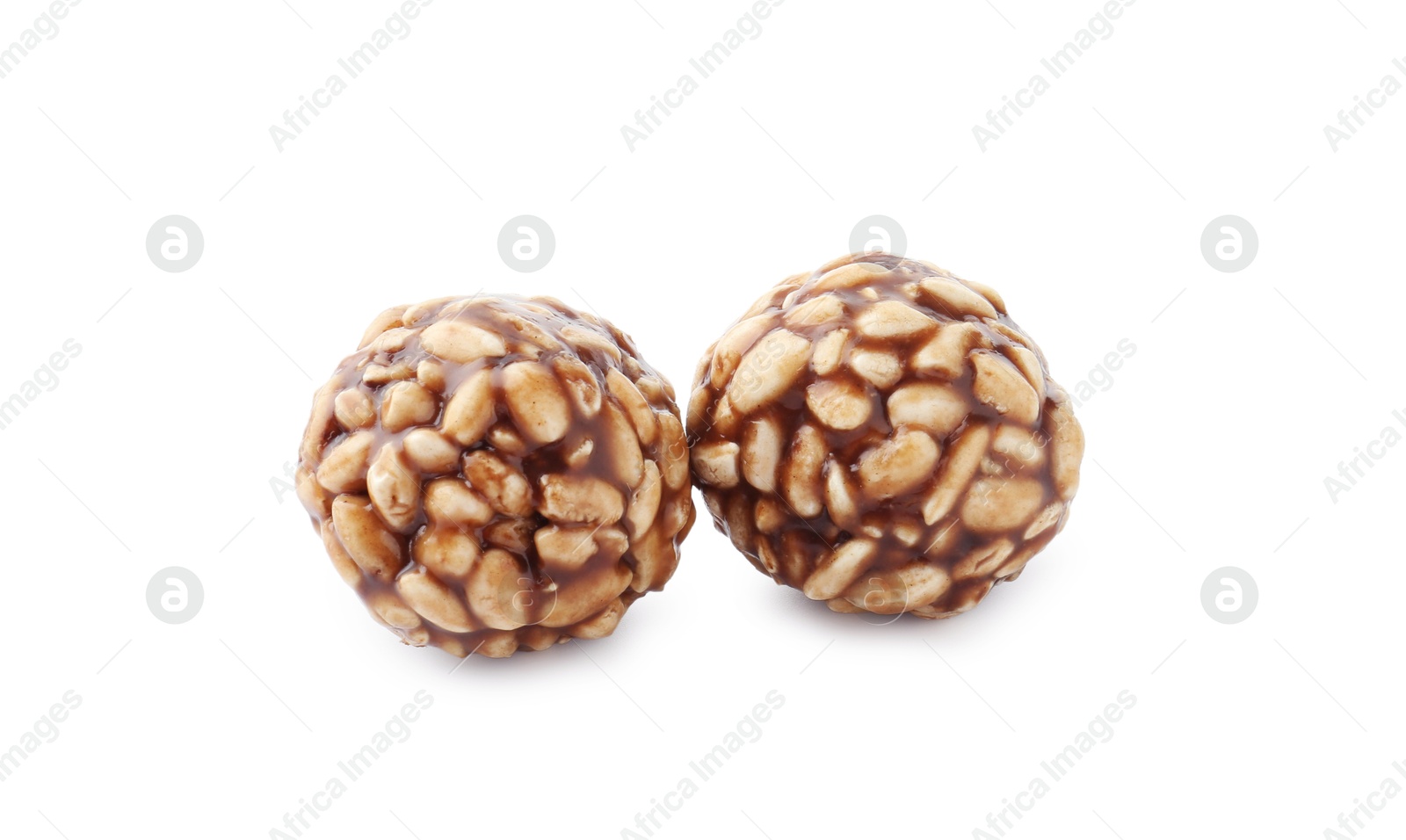 Photo of Delicious chocolate puffed rice balls isolated on white