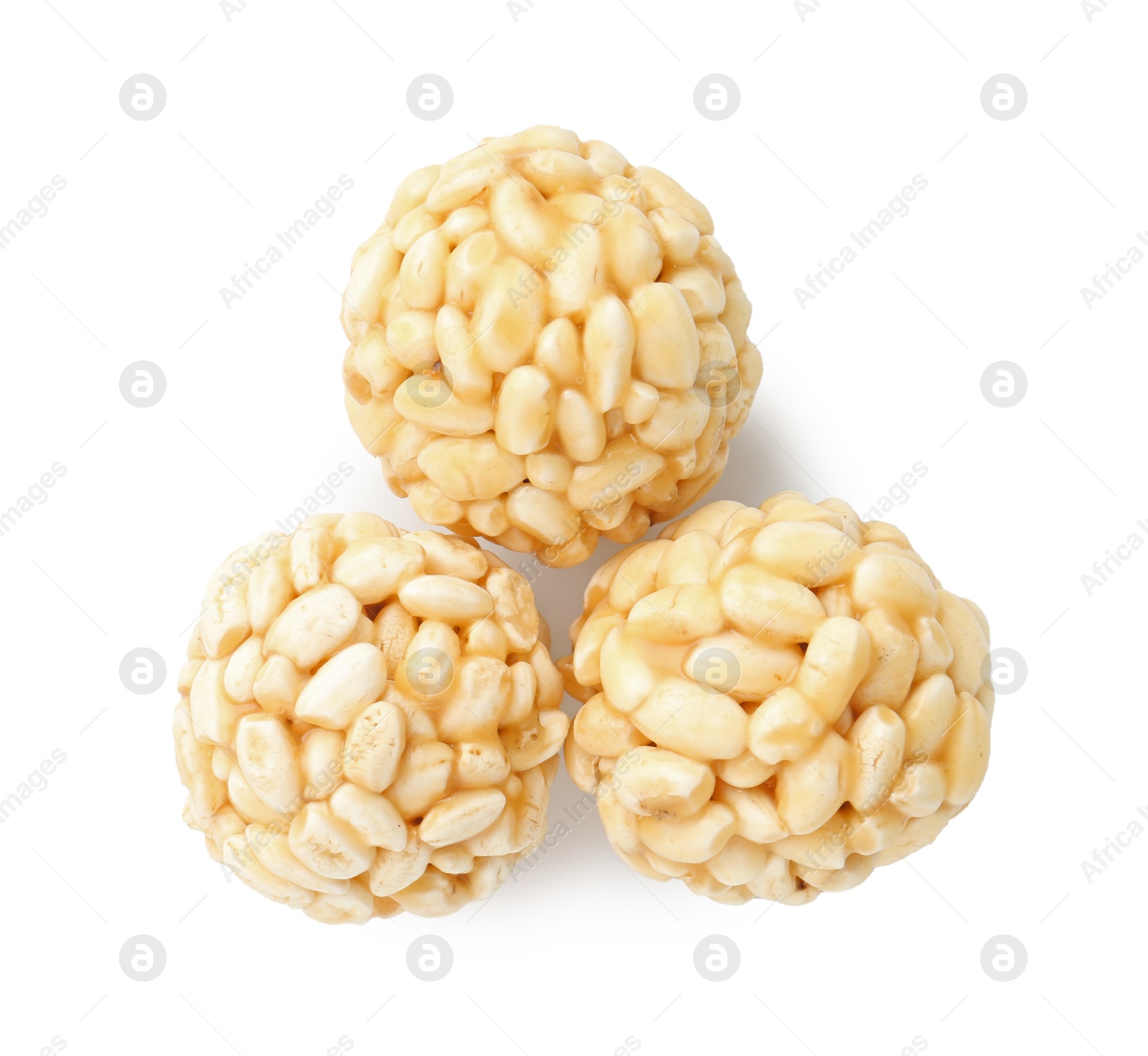 Photo of Delicious puffed rice balls isolated on white, top view