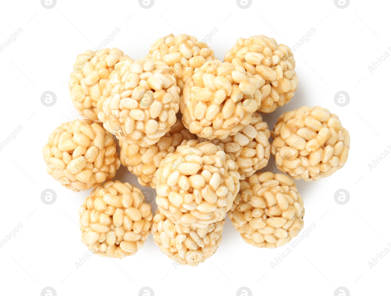 Photo of Delicious puffed rice balls isolated on white, top view