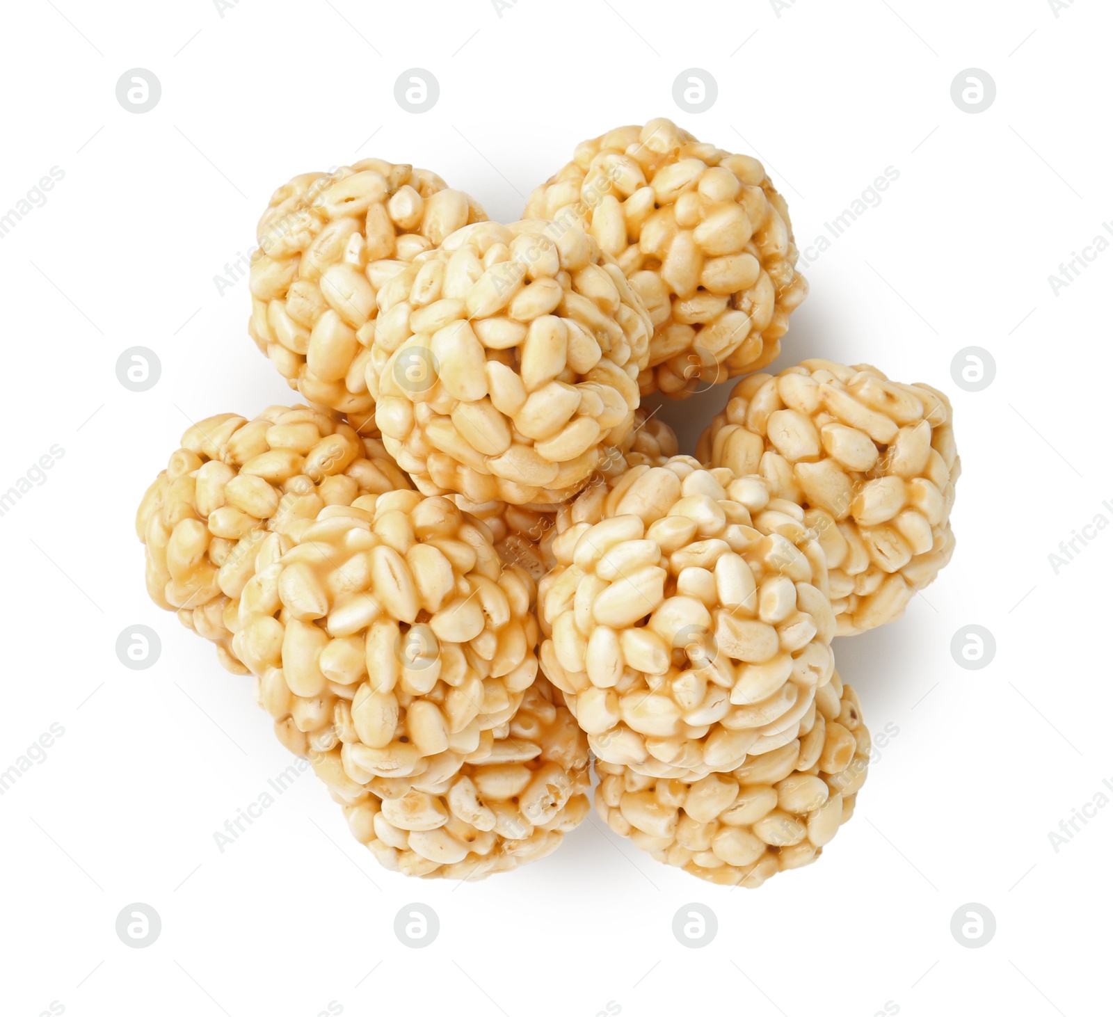 Photo of Delicious puffed rice balls isolated on white, top view