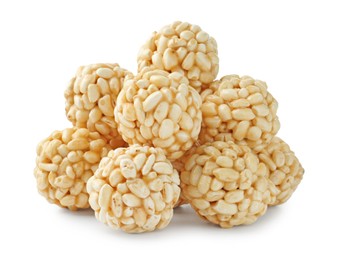 Photo of Delicious puffed rice balls isolated on white