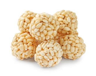 Photo of Delicious puffed rice balls isolated on white