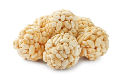 Photo of Delicious puffed rice balls isolated on white